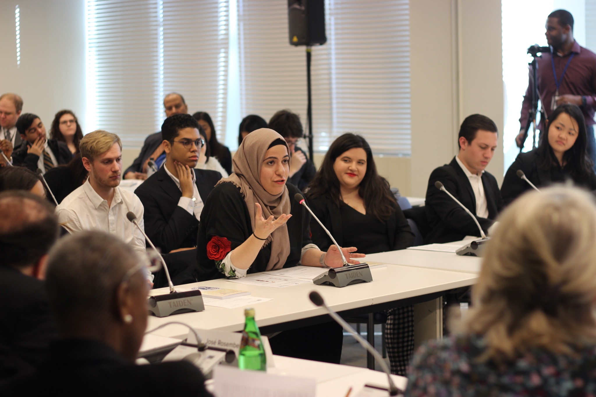 Woman talking at youth event