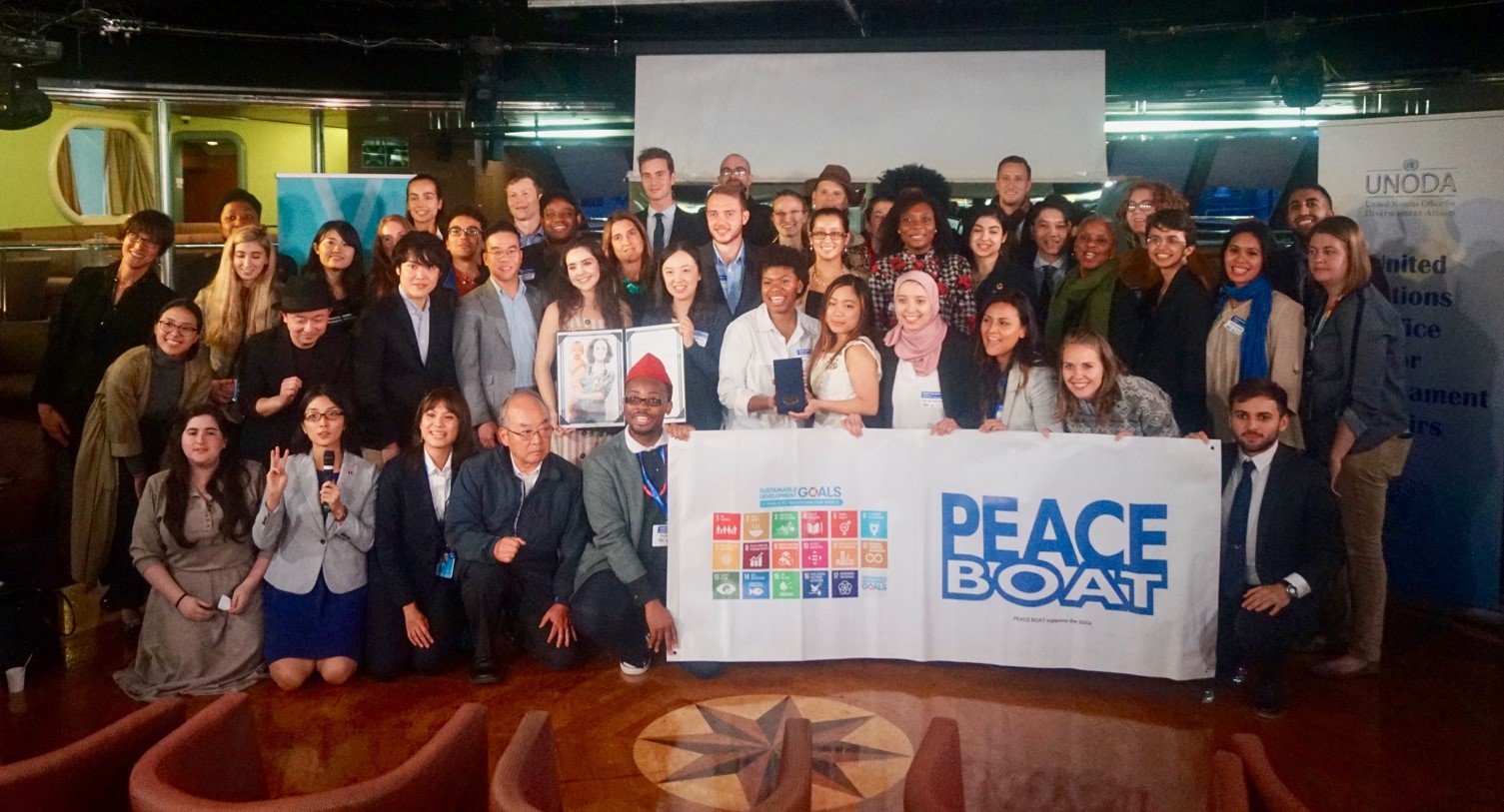 Posing with other participants in “Youth Champions for Securing our Common Future” (Photo credit: UNODA).
