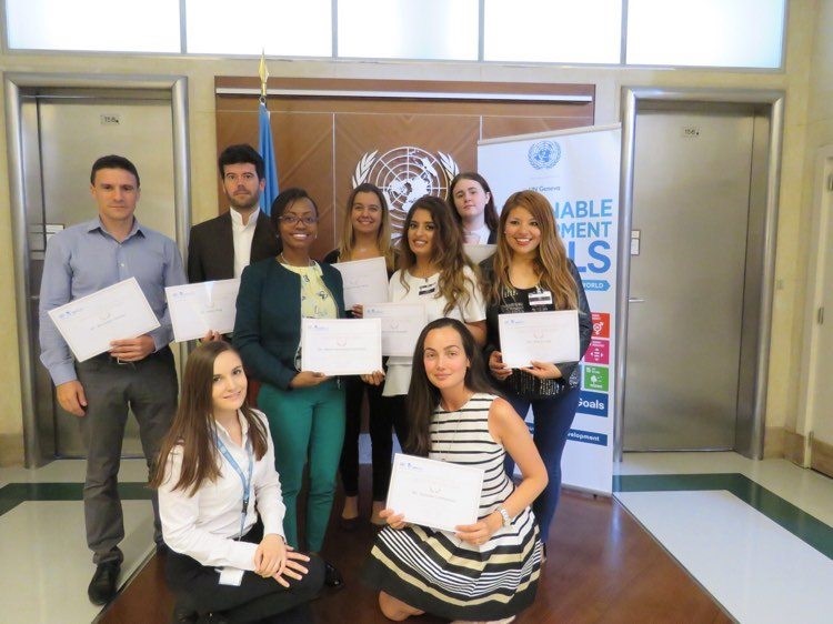 My UNITAR classmates and I show off our new diplomas.